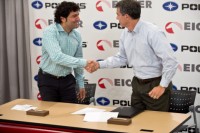 Polaris Industries Inc. CEO Scott Wine (right) and Eicher Motors Limited CEO and Managing Director Siddhartha Lal (left) happily shake hands after signing an agreement for their companies to enter into a joint venture. Both men expressed great excitement about the potential of this new joint venture, in which the companies will cooperatively develop new products for India and other emerging markets.